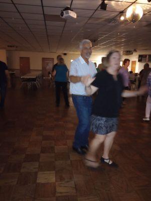 A couple dancing at VFW 7262 in Greenville, OH, as part of the Darkest County Singles