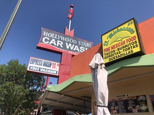 The sign next to Hollywood Stars Car Wash.