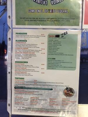 Menu. Al Pastor tacos are 2$ per piece.