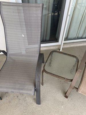 This is the patio furniture after wiping off, rusty, paint stains, debris on it. Not ready for a vacation rental stay.