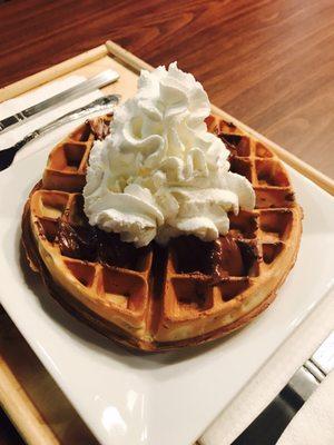 Chocolate chip waffle with Nutella and whipped cream