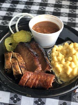 Chicken Brisket Sausage  Mac and Cheese and spicy beans for sides.   (already ate half the meat)