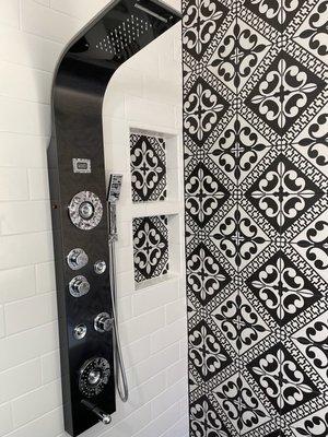 How dreamy is this custom shower?! Check out the details in the cubbies, and the best shower head ever.