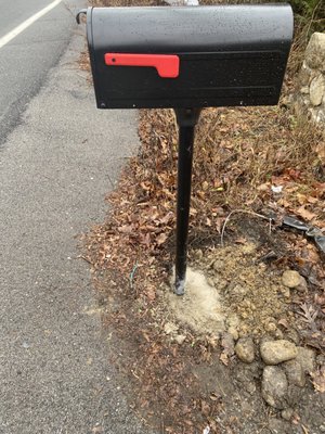 New mailbox installed after a truck hit the old mailbox