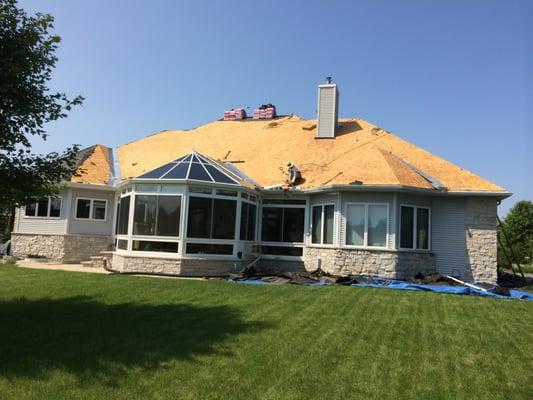 When we replace the roof from a house we tear of all the way down to the plywood and inspect all to make sure it's in good condition.