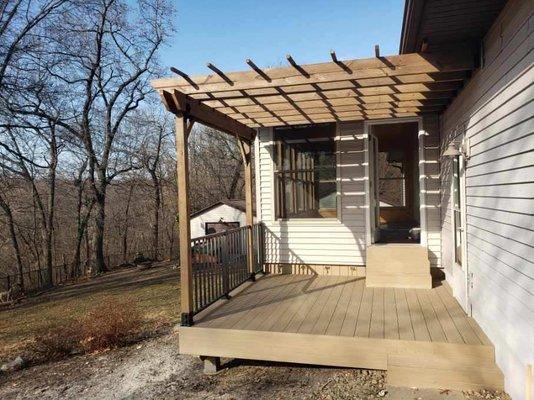 four season addition with pergola covered outdoor space on composite deck.