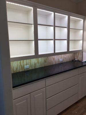 We installed LED light tape into this display cabinet