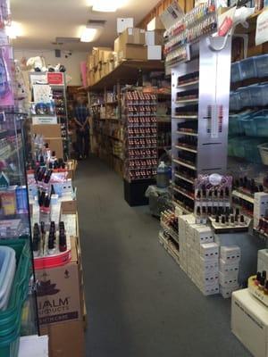 Large selection of nail and nail supply, a bit messy.