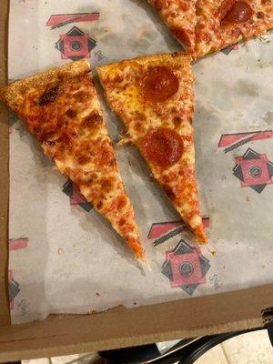 This is an a pepperoni slice and an EXTRA EXTRA cheese slice. Both were rubbery and seemingly microwaved.