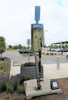 Walking Man sculpted by Levi Rinker (2012) and painted by Cynthia Young (2019)