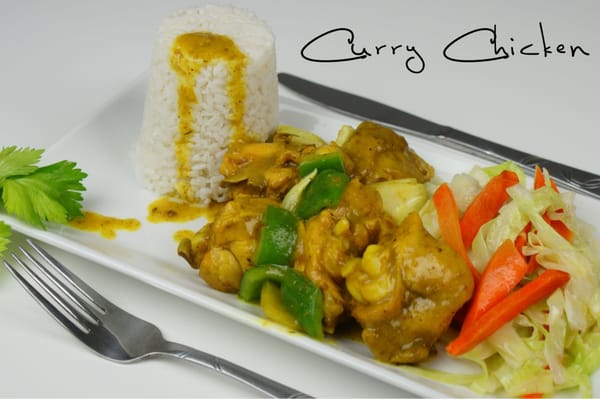 Curry chicken  served with white rice and steam cabbage & carrots