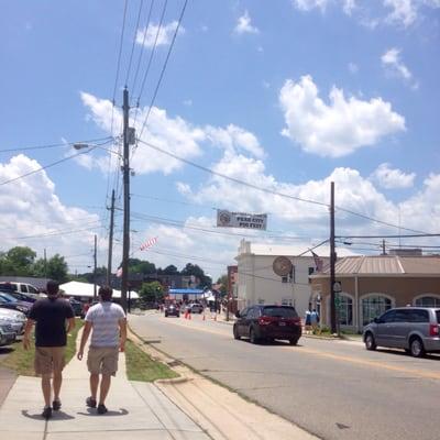 Walking up to the Peak City Pig Fest. Banners hanging and streets blocked!