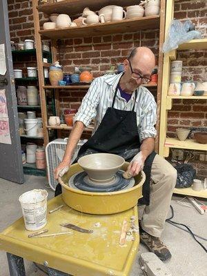 Roger making an awesome bowl on the wheel