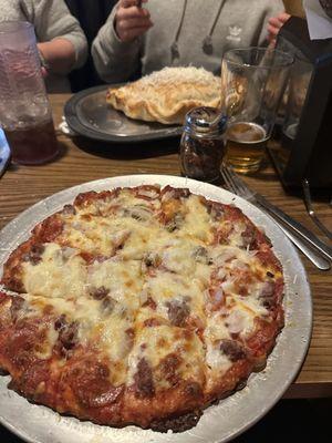 Pizza and huge calzone.