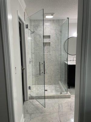 Custom frameless shower glass 84" tall custom 30" door with a 90 degree corner