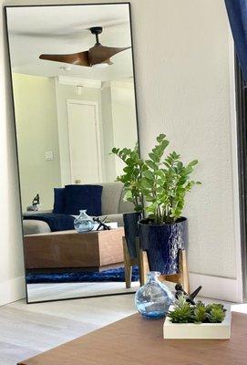 Purchased the pot & stained to match my wood pieces. Table top greenery on clearance too.  Mirror on Amazon. Modern Mid-century style.