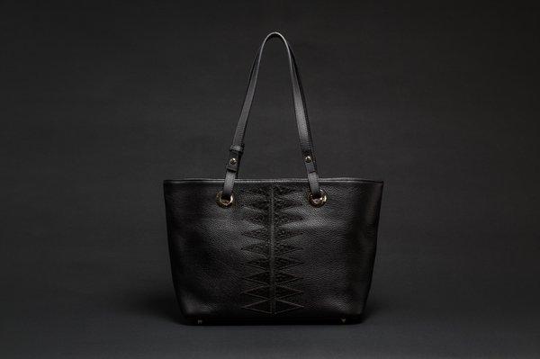 Product Photography example from RezSpine by Virgil Ortiz handbag collection.  Shot of Classic Rez Spine™ Shoulder Tote.