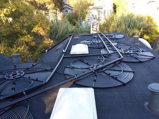 Flat roof coil installation.