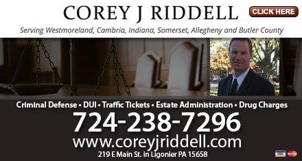 Corey J Riddell