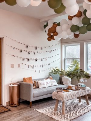 cute cafe/seating area with photo wall