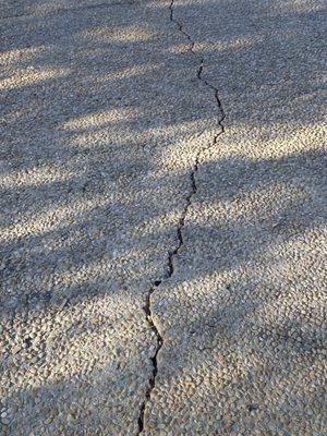 Broken pebble finish driveway in a gated community.