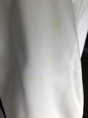 Multiple yellow stains on the other shirt. Didn't come out after second cleaning.