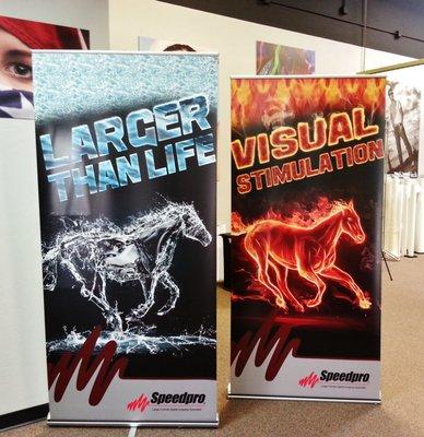 Retractable banner stands include full customization. Inquire about one for your business today!