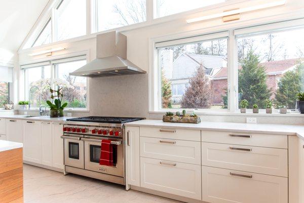 Leicht Kitchen in Saddle Rock, NY. Sub-zero / Wolf Appliances, Caesar stone countertop, Team7 Chairs and bar stools.