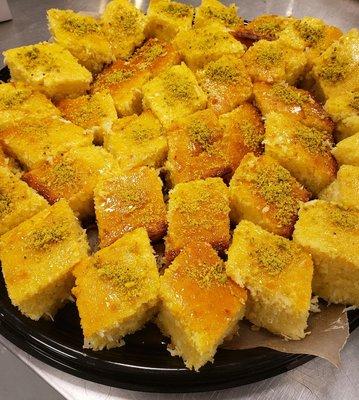 Greek semolina with honey, orange, rose blossoms and pistachios.