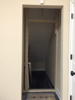 Install of wall and door to basement