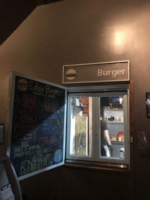 You can order/pick up Eden Burger order inside the Village Idiot