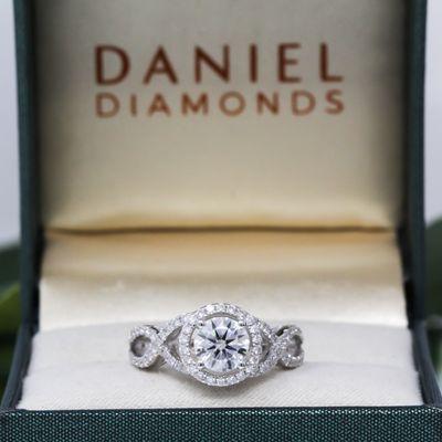 Custom 14k white gold engagement ring with moissanite.