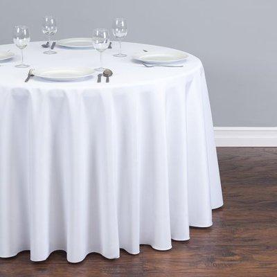 A white 120 inch round polyester tablecloth features a serged hem, seamless design, and durable fabric quality!