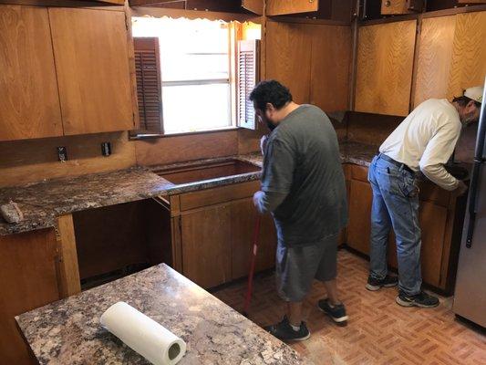 Tim and his assistant installing our laminate countertops.