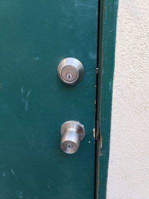 Door lock and handle after service with deadbolt installed.