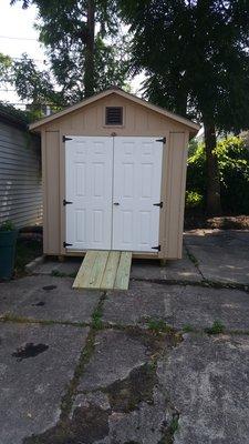 outside of shed with included removeable ramp