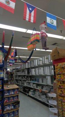 you can see pinatas and hammocks hanging from the ceiling