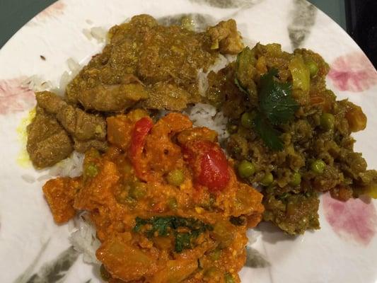 (clockwise from top) Lamb Curry, Baingan Bharta, and Vegetable Curry