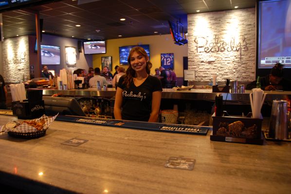 Our main bar at Peabody's with friendly staff.