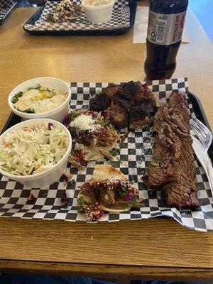 Brisket, burnt ends, coleslaw, corn, and tacos.