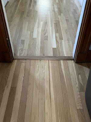 Existing and new hardwood floor in a older home.