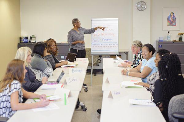 Lynnette, VP of Programming and Services, teaches a class