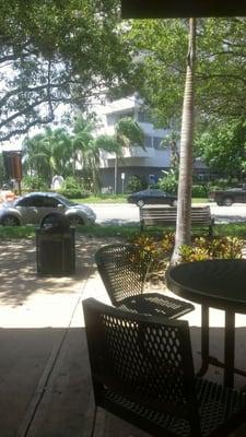 Outdoor cafe tables for a shady breeze