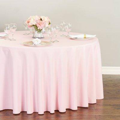 A pink 120 inch round polyester tablecloth features a serged hem, seamless design, and durable fabric quality!