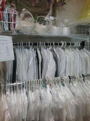 Boys Tuxedo: white,  ivory  or black. Sizes from Newborn to size 20.  Tuxedo with Virgin de Guadalupe available to size 7.