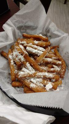 Funnel cake fries are a perfect way to end a meal. Delicious