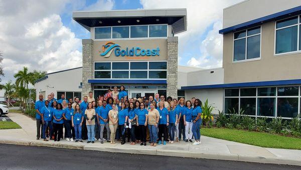 Employees celebrating a newly-renovated building.