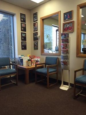 Small, warm waiting room complete with tons of magazines for kids and adults.