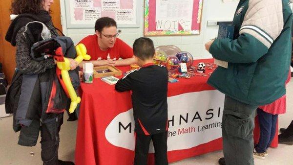 Our games table at one of the local school fairs!  We also host FREE math nights for schools.