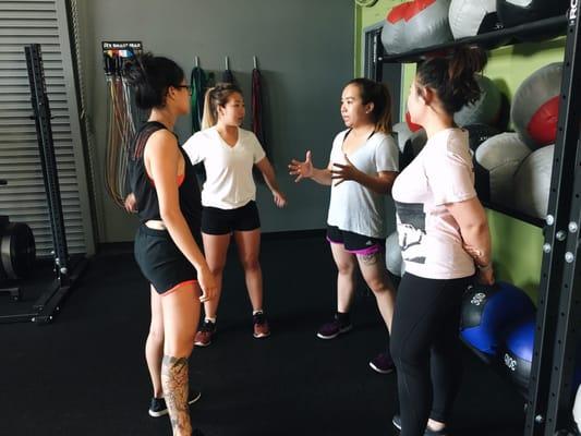 Julie sharing her knowledge with program 2, AVA FIT girls Linda, Wendy, and Lynda